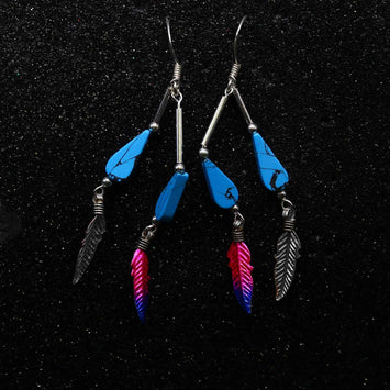 Boucles d'oreilles plume en argent SE069