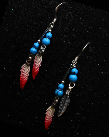 Boucles d'oreilles plume en argent SE070