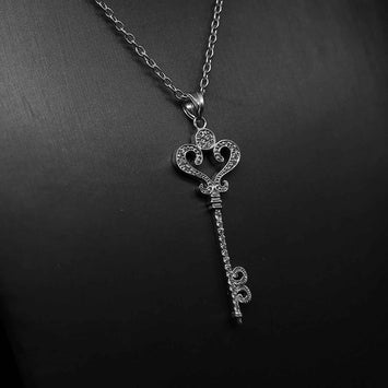 Pendentif clé en argent SP066