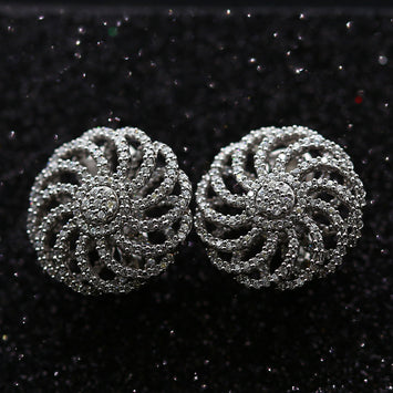 Boucles d'oreilles fleur tourbillon en argent SE001